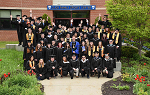 Group shot of 2018 Spring Graduates outside the Click Family Athletic Center. 