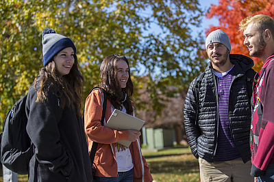 Three students standing outside on the Landmark College 